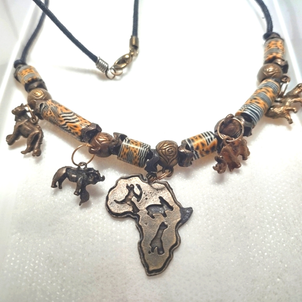 African Necklace with Brass Buffalo Giraffe Animal Charms